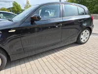 Używany BMW 116 122 KM (89 kW) 2009 Czarny Hatchback