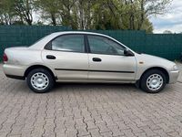 Second-hand Mazda 323 88 CP (64 kW) 1996 Auriu Berlinǎ