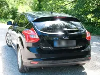 Usado Ford Focus Titanium 125 CV (91 kW) 2014 Negro Berlina