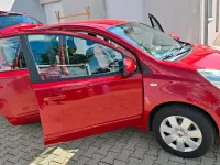 Gebraucht Nissan Note 88 PS (64 kW) 2009 Rot Kleinwagen