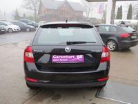 Gebraucht Skoda Rapid Ambition 90 PS (66 kW) 2014 Schwarz metallic Kombi