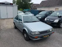 Gebraucht Mazda 323 60 PS (44 kW) 1989 Grau Kleinwagen