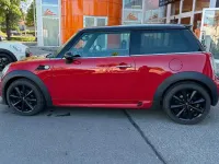 Gebraucht Mini John Cooper Works Chili 122 PS (89 kW) 2011 Chili (solar) red Kleinwagen