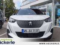 Gebraucht Peugeot e-2008 GT 100 kW (136 PS) 2023 Perlmuttweiß perleffekt SUV