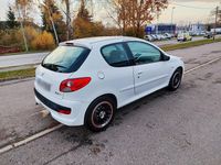 Gebraucht Peugeot 206+ 74 PS (54 kW) 2011 Weiß Kleinwagen