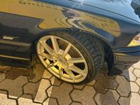 Gebraucht BMW 318 Cabriolet 118 PS (86 kW) 1995 Schwarz Cabrio