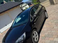 Gebraucht Opel Astra Edition 125 PS (91 kW) 2012 Braun Kombi