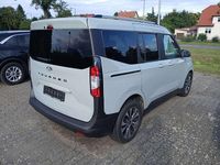 Gebraucht Ford Tourneo Courier Titanium 125 PS (91 kW) 2024 Grau Van / Kleinbus