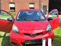 Gebraucht Toyota Aygo 68 PS (50 kW) 2009 Rot Kleinwagen