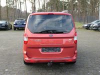 Gebraucht Ford Tourneo Courier Titanium 101 PS (74 kW) 2014 Rot Van / Kleinbus