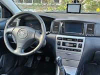 Używany Toyota Corolla Sol 116 KM (85 kW) 2003 Szary Sedan/Limuzyna