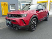 Gebraucht Opel Mokka 131 PS (96 kW) 2024 Rubin rot / dach schwarz SUV