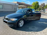 Gebraucht BMW 116 122 PS (89 kW) 2009 Schwarz Kleinwagen