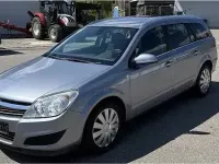 Używany Opel Astra 125 KM (91 kW) 2009 Srebrny Kombi