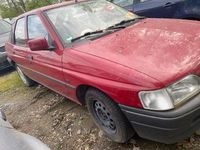 Używany Ford Escort 90 KM (66 kW) 1990 Czerwony Sedan/Limuzyna