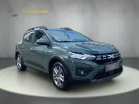 Gebraucht Dacia Sandero Expression 101 PS (74 kW) 2023 Grün