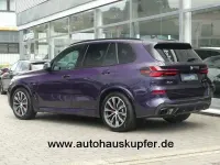 Gebraucht BMW X5 Performance 489 PS (359 kW) 2024 Sonderlack techno violett SUV