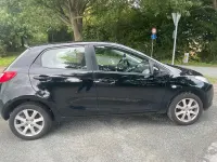 Gebraucht Mazda 2 75 PS (55 kW) 2009 Schwarz Kleinwagen