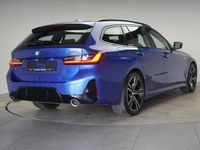 Gebraucht BMW 320 M Sport 184 PS (135 kW) 2023 Portimao blau Kombi