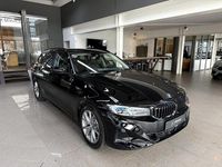 Gebraucht BMW 320e Sport Line 204 PS (150 kW) 2024 Schwarz Kombi