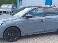Gebraucht Opel Corsa 101 PS (74 kW) 2024 Grau mit schwarzem dach Kleinwagen