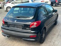 Gebraucht Peugeot 206+ 73 PS (53 kW) 2011 Schwarz Kleinwagen
