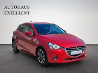 Używany Mazda 2 Kizoku 90 KM (66 kW) 2018 Czerwony Sedan/Limuzyna