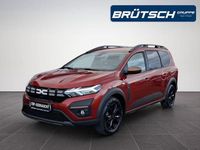 Gebraucht Dacia Jogger Extreme 110 PS (80 kW) 2024 Terrakottabraun metallic Van / Kleinbus