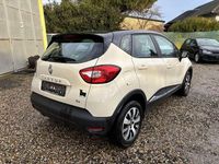 Gebraucht Renault Captur Experience 90 PS (66 kW) 2016 Elfenbein d16 + schwarz gne SUV