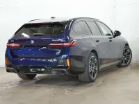 Gebraucht BMW 550e M Sport 313 PS (230 kW) 2025 Tansanitblau ii metallic Kombi