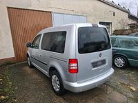 Second-hand VW Caddy 86 CP (63 kW) 2011 Argintiu Monovolum
