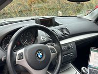 Second-hand BMW 116 122 CP (89 kW) 2006 Argintiu Hatchback