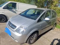 Second-hand Opel Meriva 106 CP (77 kW) 2003 Argintiu Monovolum