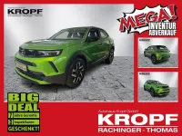 Gebraucht Opel Mokka Elegance 101 PS (74 kW) 2024 Lackierung matcha green/typ au SUV