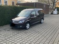 Używany VW Caddy Maxi 102 KM (75 kW) 2012 Purpurowy Minivan