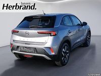 Gebraucht Opel Mokka-e Elegance 100 kW (136 PS) 2022 Kontrast grau/quarz silber SUV