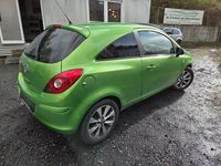 Gebraucht Opel Corsa 69 PS (50 kW) 2014 Grün Kleinwagen