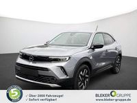 Gebraucht Opel Mokka-e Elegance 100 kW (136 PS) 2022 Kontrast grau/quarz silber SUV
