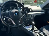 Gebraucht BMW 116 122 PS (89 kW) 2009 Schwarz Kleinwagen