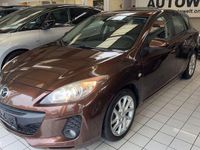 Używany Mazda 3 Edition 105 KM (77 kW) 2012 Brązowy Sedan/Limuzyna