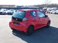 Gebraucht Toyota Aygo 68 PS (50 kW) 2009 Rot Kleinwagen