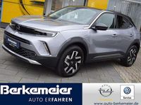 Gebraucht Opel Mokka-e Elegance 100 kW (136 PS) 2022 Kontrast grauquarz silber (metallic) SUV