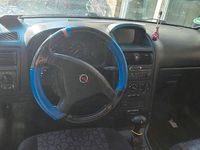 Używany Opel Corsa 110 KM (80 kW) 2000 Szary Coupe