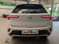 Gebraucht Opel Mokka-e Ultimate 100 kW (136 PS) 2023 Lack weiss banquise/typ au SUV