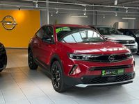 Gebraucht Opel Mokka-e Ultimate 100 kW (136 PS) 2023 Lackierung rot rubi/typ aussenverkleidun (metallic) SUV