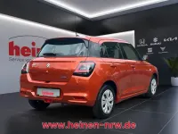 Neu Suzuki Swift Club 83 PS (61 kW) 2025 Orange Limousine