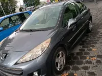 Gebraucht Peugeot 207 74 PS (54 kW) 2011 Grau Kleinwagen