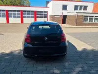 Gebraucht BMW 116 122 PS (89 kW) 2009 Schwarz Kleinwagen