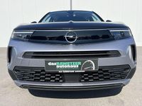 Gebraucht Opel Mokka-e Elegance 100 kW (136 PS) 2024 Kontrast grau SUV