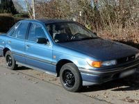 Second-hand Mitsubishi Lancer 97 CP (71 kW) 1990 Albastru Berlinǎ